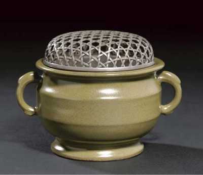 circa 1800 A teadust glazed censer and pierced silver cover